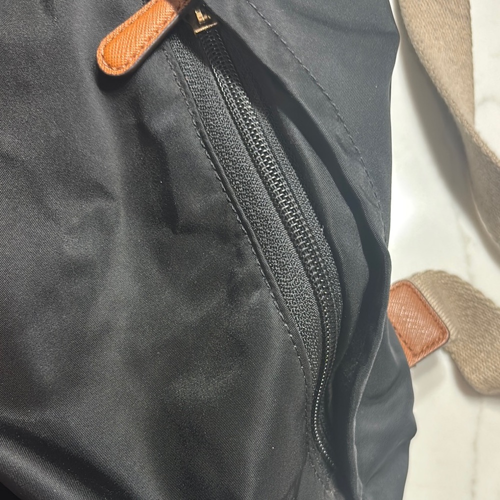Michael Kors Black and Tan Backpack with Leather Accents - Picture 13 of 13